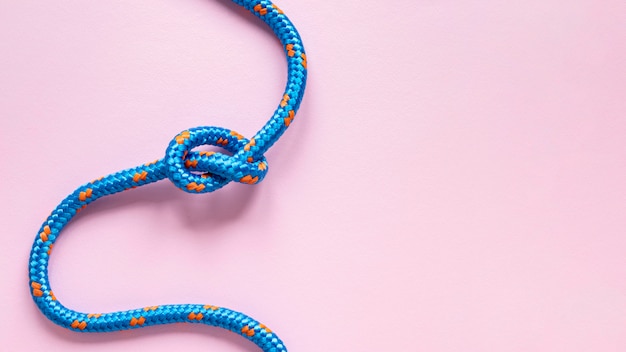 Top view blue rope with knot copy space