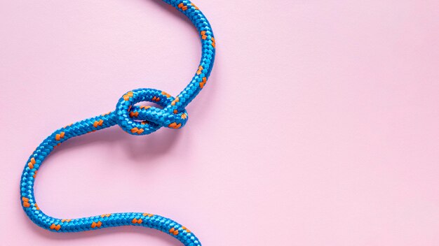 Top view blue rope with knot copy space