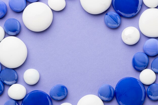 Top view blue and white pebbles frame