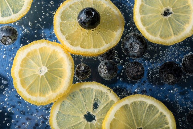 Top view blueberries and lemon slices