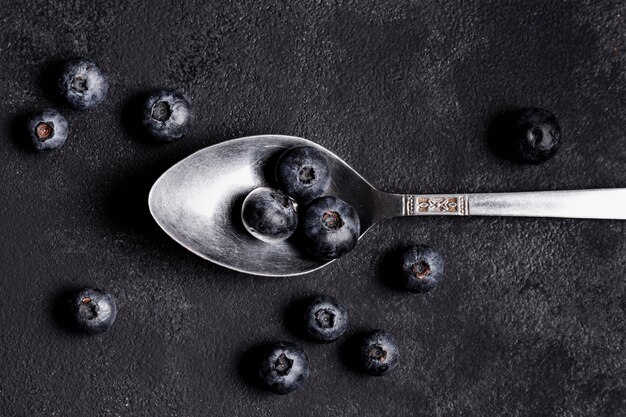 Top view of blueberries on spoon