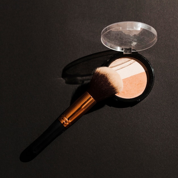 Free photo top view blush with make up brush