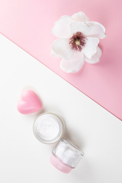 Top view of body butter and hibiscus