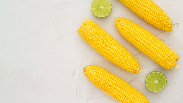 Free photo top view boiled corn with copy space