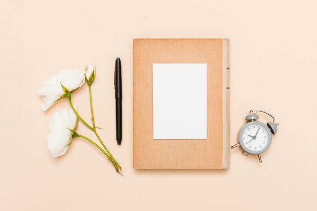 Top view of book and flowers