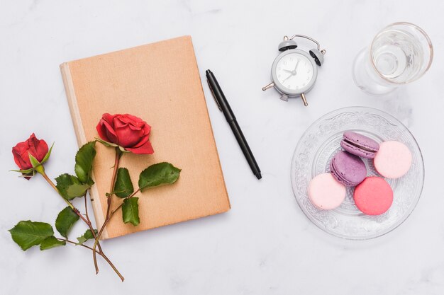 Top view of book and flowers