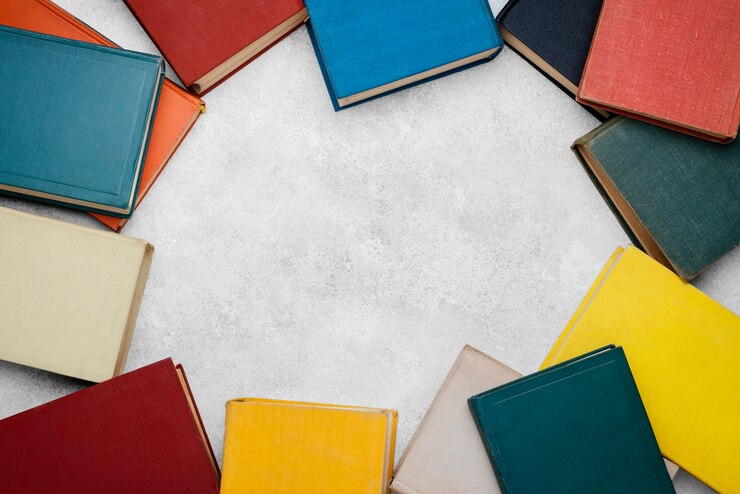 Free Photo top view of books in circle with copy space