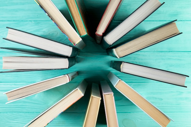 Top view books with wooden background