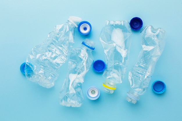 Top view bottles and caps plastic waste