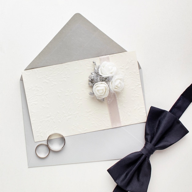 Top view bow tie and rings wedding concept