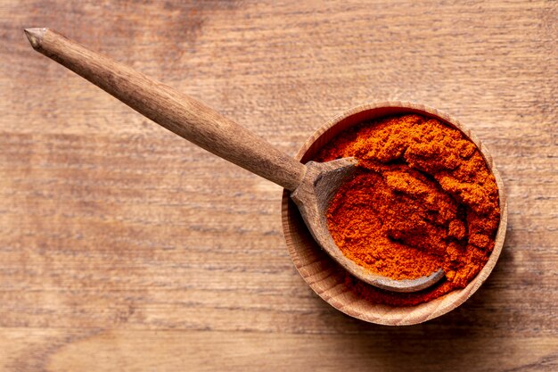 Top view of bowl of cinnamon with copy space