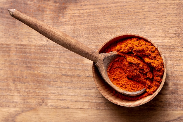 Top view of bowl of cinnamon with copy space