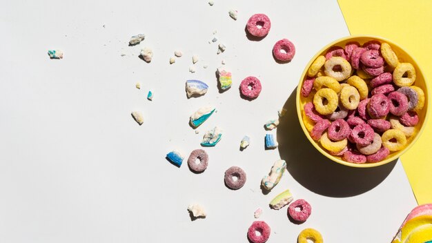 Top view bowl full of delicious cereals and copy space