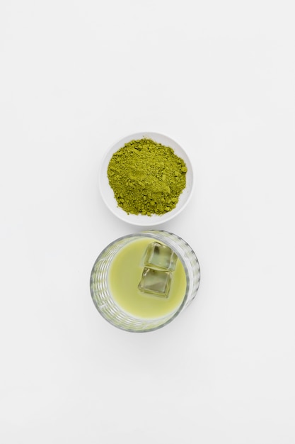 Top view bowl and glass with matcha