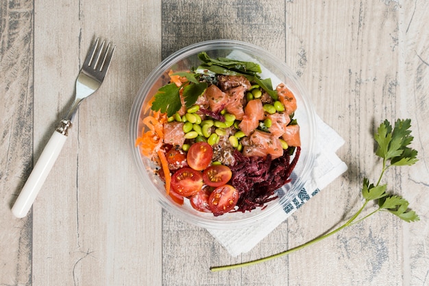 Top view of bowl with assortment of healthy food