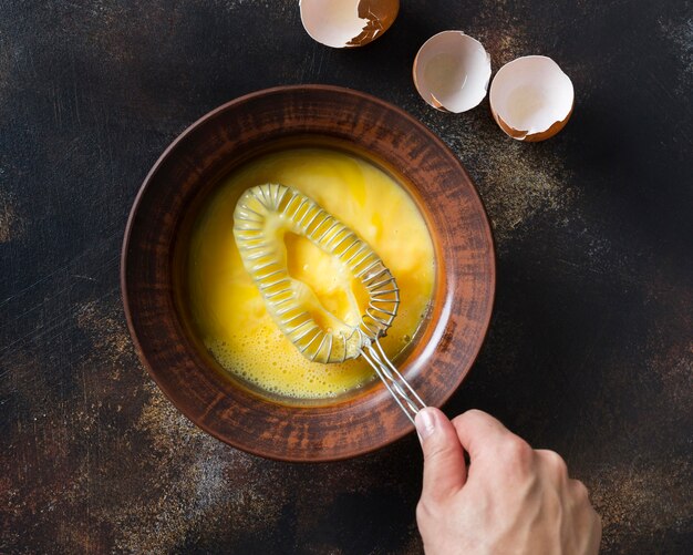 Top view bowl with eggs yolk