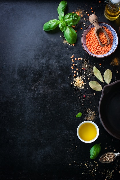 Top view of bowl with lentils and variety of condiments