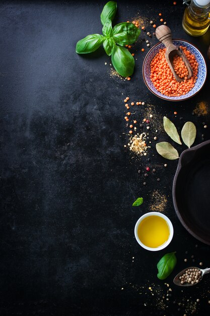 Top view of bowl with lentils and variety of condiments