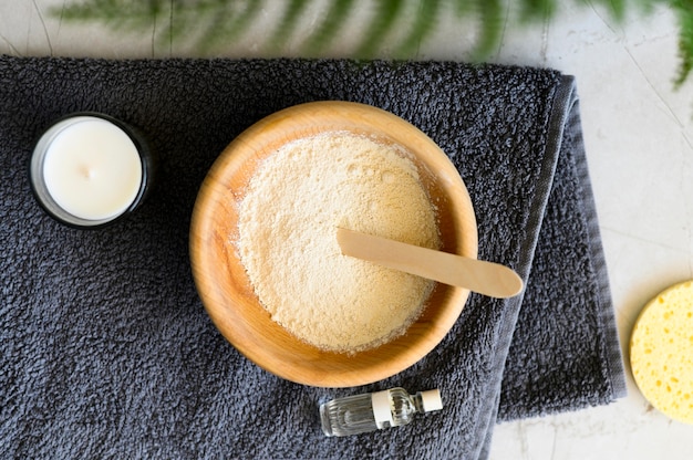 Free photo top view of bowl with powder and essential oil