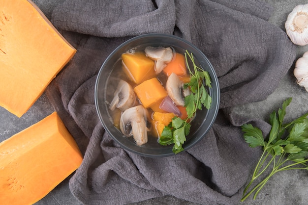 Free photo top view bowl with soup ingredients and broth