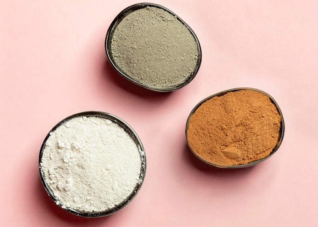 Top view of bowls with clay powder mixture