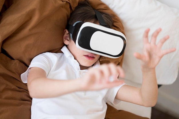 Top view boy with virtual reality headset