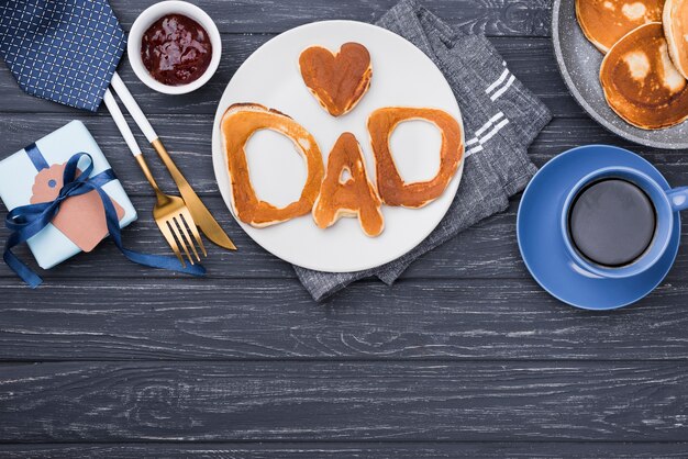 Top view bread letters for father's day copy space