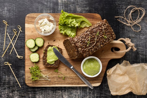 Top view of bread slices for sandwiches with cucumbers