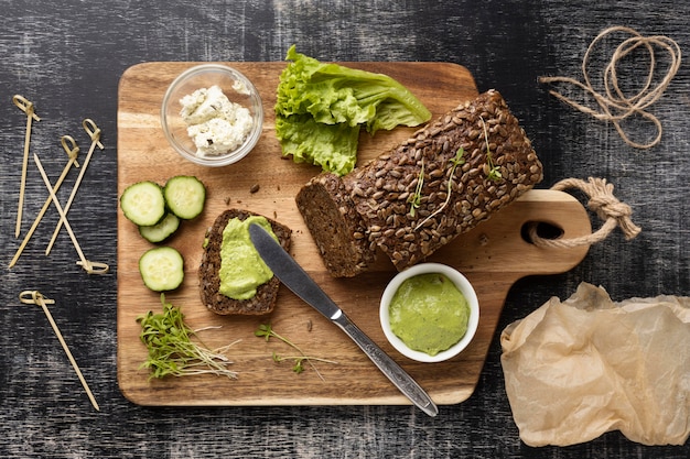 Top view of bread slices for sandwiches with cucumbers