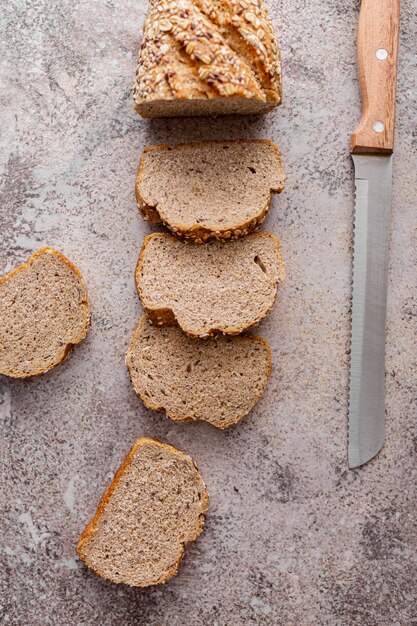 Free photo top view bread on stucco background