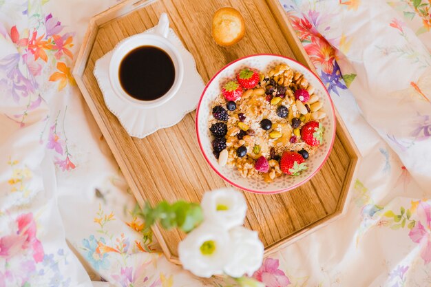 Top view of breakfast in bed