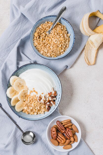 Top view breakfast bowl with oats and fruits