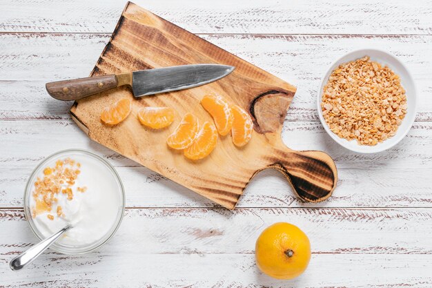 Top view breakfast bowl with yogurt and fruits