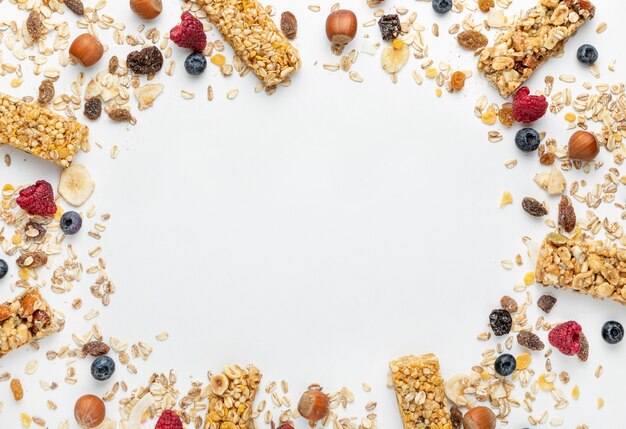 Top view of breakfast cereal bars with fruits