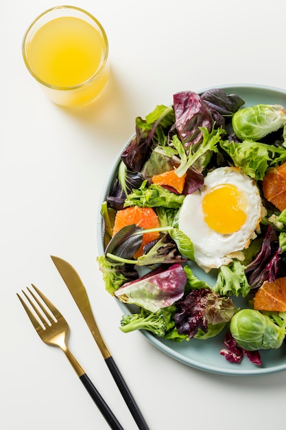 Top view breakfast with lettuce and egg