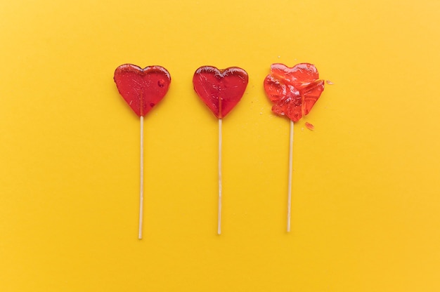 Top view of broken heart candy treat on stick