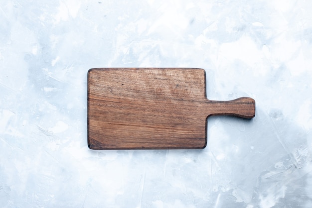 Top view of brown wooden desk, for fod on light, light food wood wooden