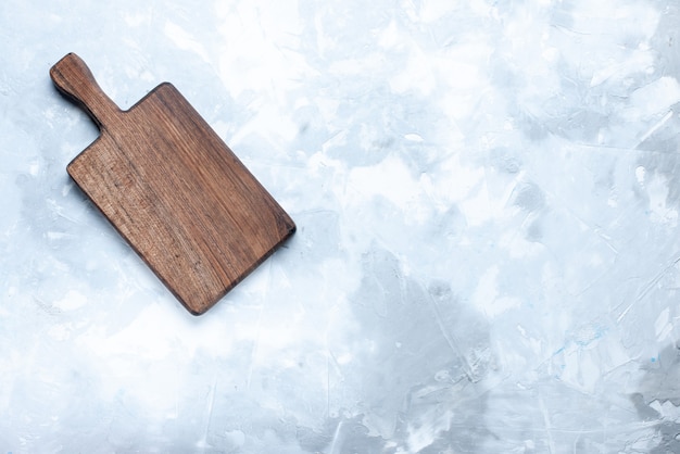 Top view of brown wooden desk, for food on light, wood wooden