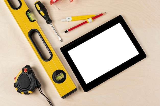 Top view of builder desk with tablet mock-up