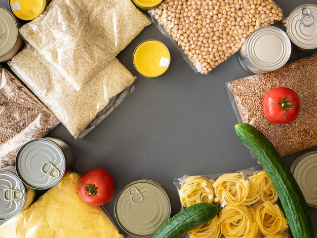 Top view of bunch of food provisions for donation with copy space