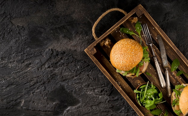 Top view burgers in basket with copy-space