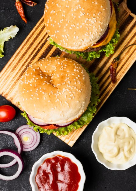 Top view of burgers with ketchup