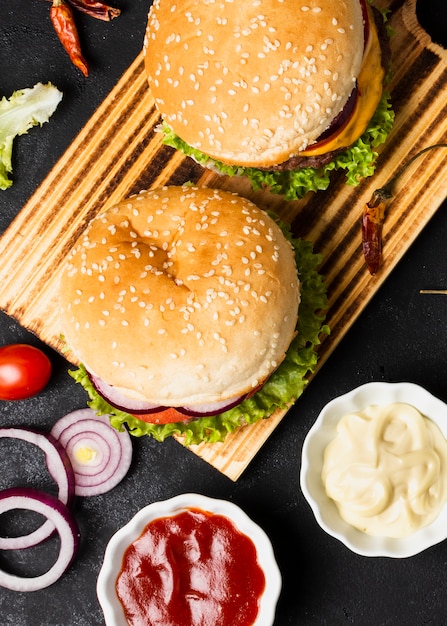 Top view of burgers with ketchup