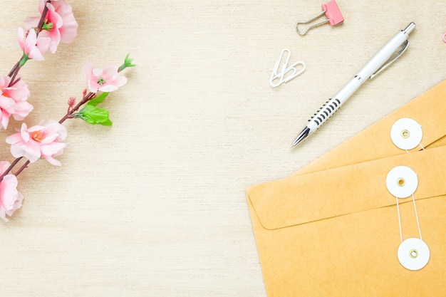Free photo top view business office desk background.the pen letter flower c