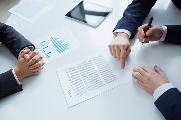 Free Photo top view of businessman signing documents