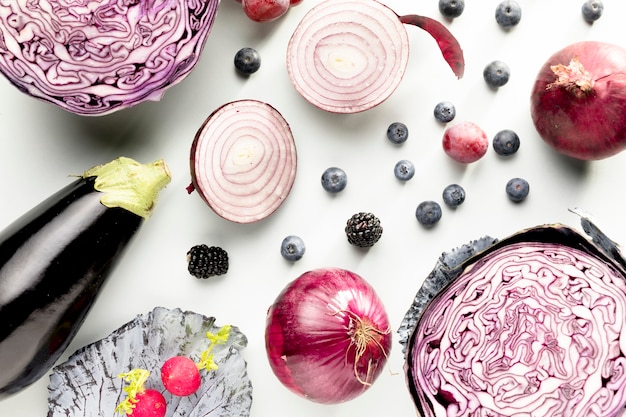 Free photo top view of cabbage with onions and eggplant