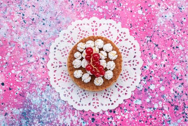 Top view cake with cranberries on the colored background cake biscuit sugar sweet bake