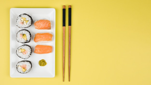 Top view of california rolls and nigiris