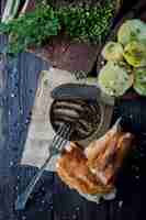 Free photo top view canned sprat with boiled potatoes and fork and bread