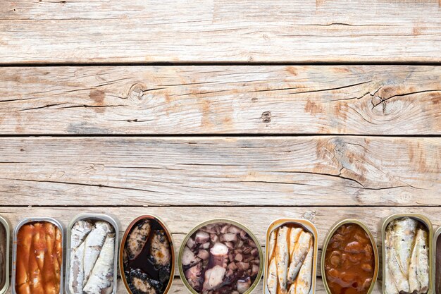 Top view of cans of seafood with copy space